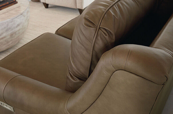 Stationary reclining leather chair